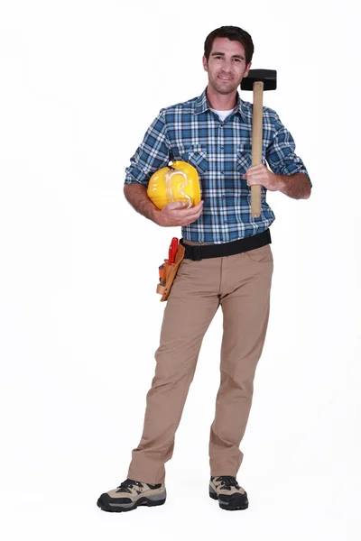 Craftsman holding a huge hammer — Stock Photo, Image
