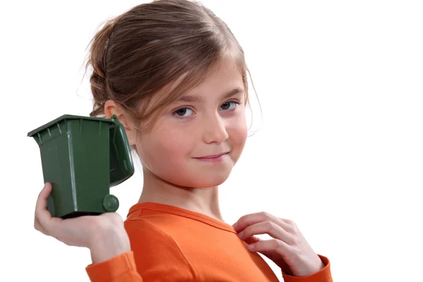 Girl holding mini recycling bin — Stock Photo, Image