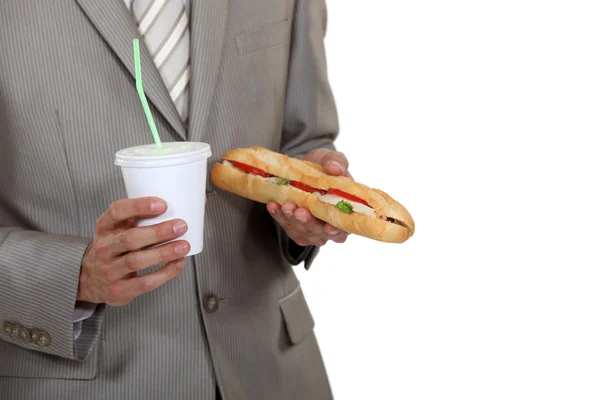 Businessman with a sandwich — Stock Photo, Image