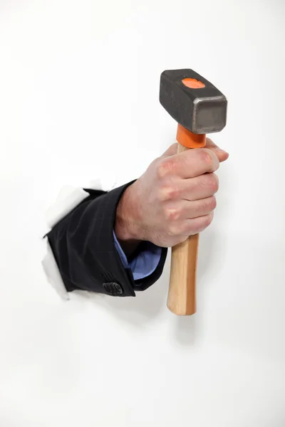 Male hand holding hammer — Stock Photo, Image