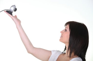 Woman holding a webcam clipart