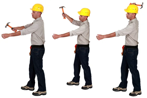 Tradesman using a hammer — Stock Photo, Image