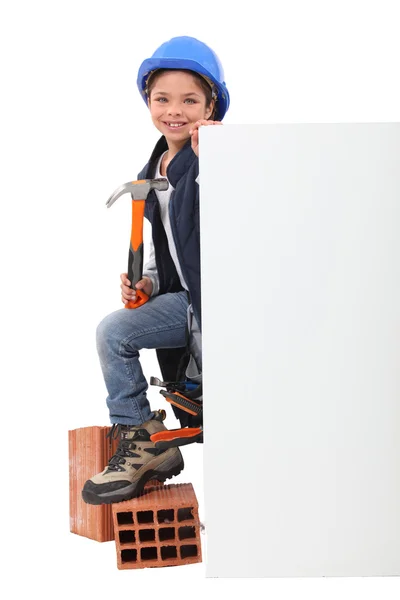 Girl pretending to be a construction worker — Stock Photo, Image