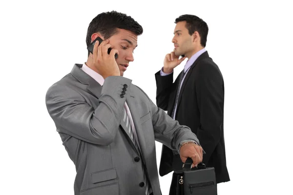 Twee ondernemers via de telefoon. — Stockfoto