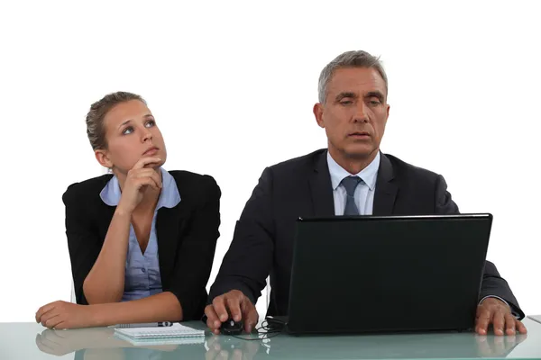 Businessman and his assistant working together — Stock Photo, Image