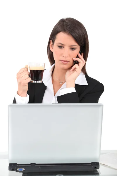 Businesswoman with a cup of coffee — Stock Photo, Image