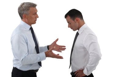 Boss and employee having a serious discussion clipart