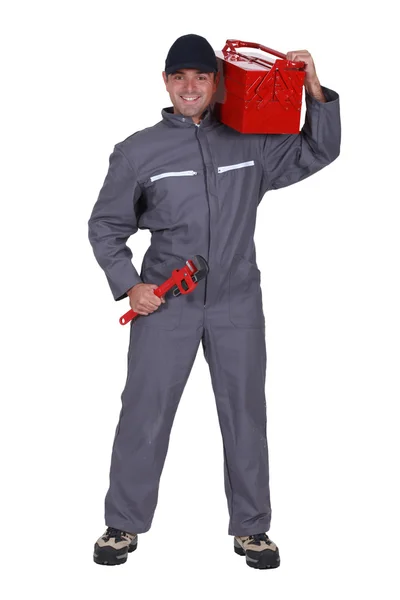 Plumber with all the tools he needs — Stock Photo, Image
