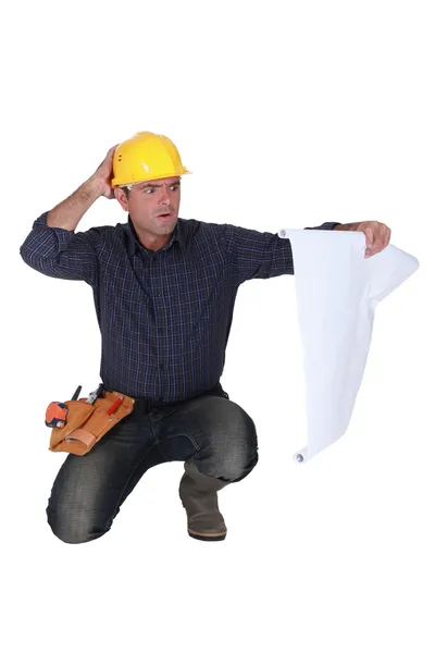 Worker on his knees — Stock Photo, Image