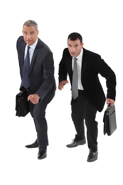 Dos hombres de negocios compitiendo entre sí — Foto de Stock