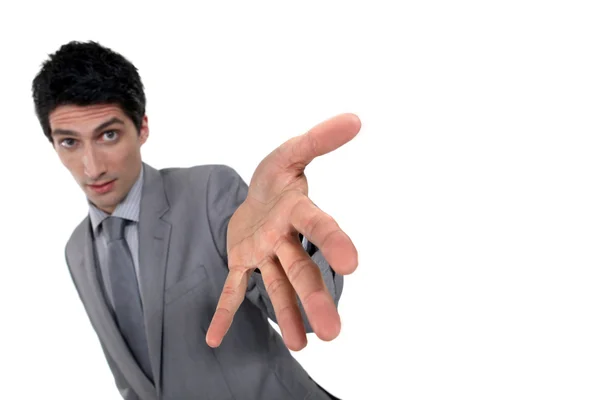 Business man presenting his hand. — Stock Photo, Image