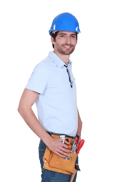 Craftsman wearing a tool belt — Stock Photo, Image