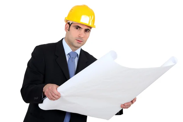 Engineer studying plans — Stock Photo, Image