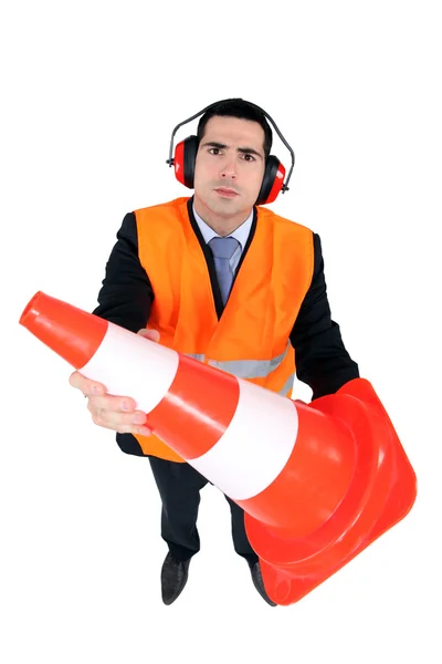 Stern man with ear defenders — Stock Photo, Image