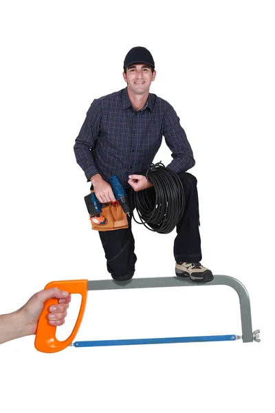 Eletricista ajoelhado com broca — Fotografia de Stock