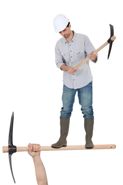 Man with a pickaxe — Stock Photo, Image