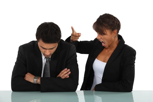 Woman reprimanding her employee — Stock Photo, Image
