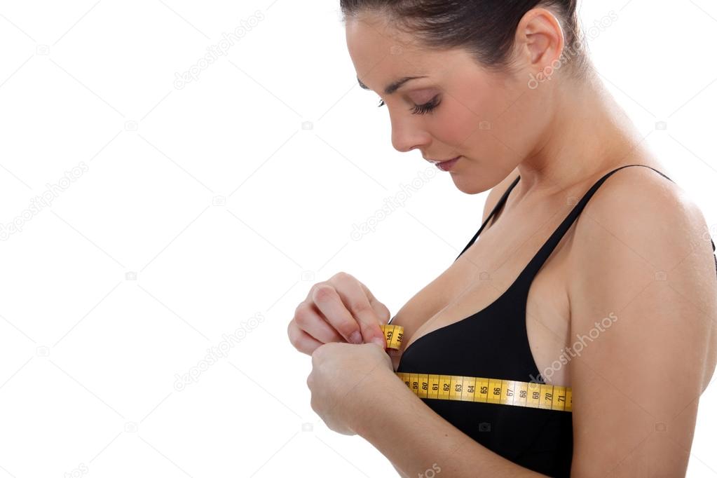 Woman measuring chest size Stock Photo by ©photography33 17401151