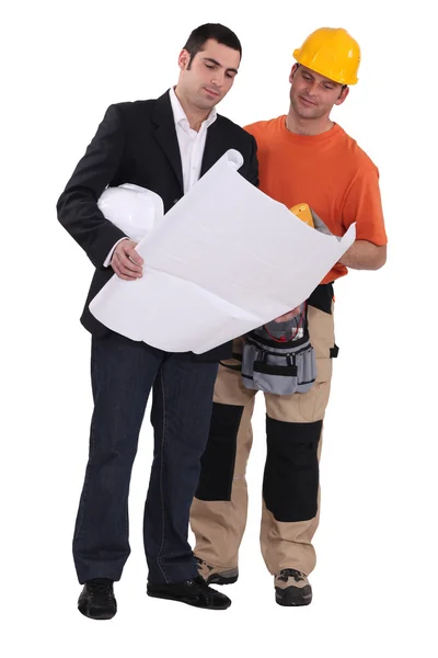 Comerciante e engenheiro trabalhando juntos — Fotografia de Stock
