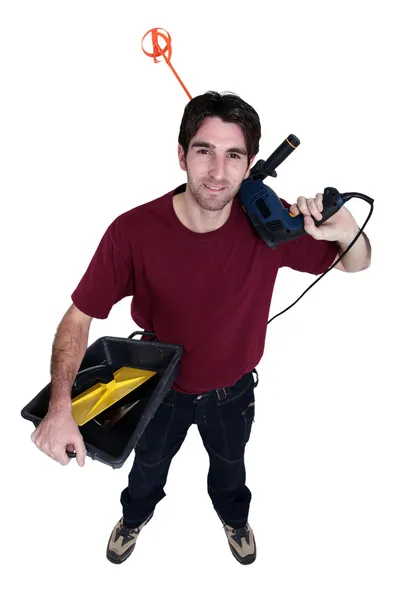 Decorator with a drill and mixing paddle — Stock Photo, Image