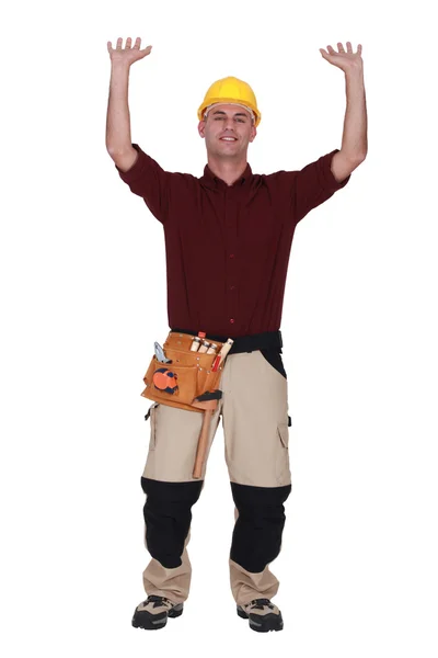 Trabajador manual con los brazos levantados — Foto de Stock
