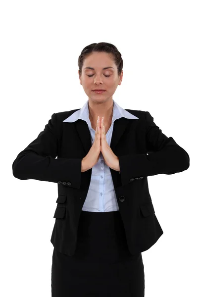 Businesswoman using relaxation techniques — Stock Photo, Image