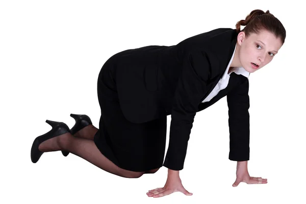 A businesswoman on all fours. — Stock Photo, Image