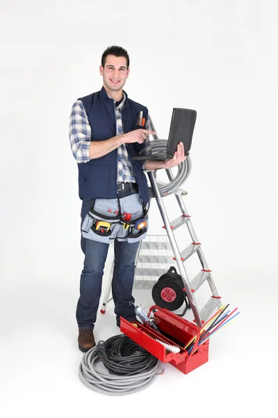 Electrician stood with his equipment — Stock Photo, Image