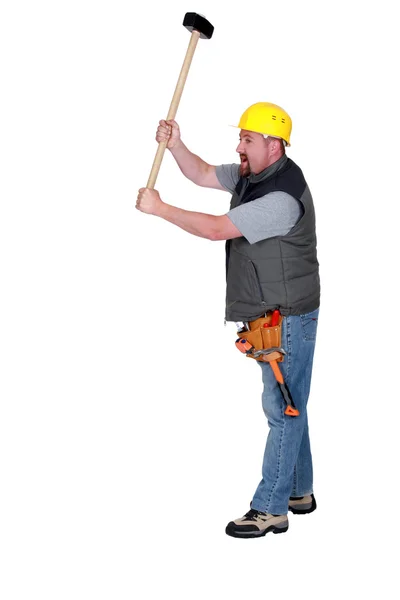 Tradesman holding a mallet — Stock Photo, Image