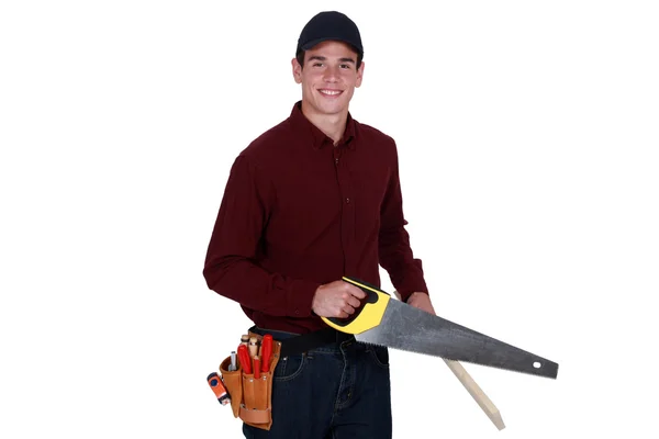 Carpenter using hand-saw — Stock Photo, Image