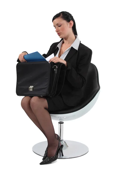 Smart employee sitting on a chair — Stock Photo, Image