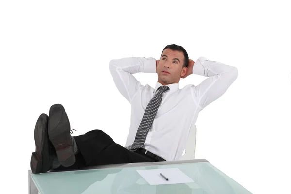 Man reclining in his chair — Stock Photo, Image