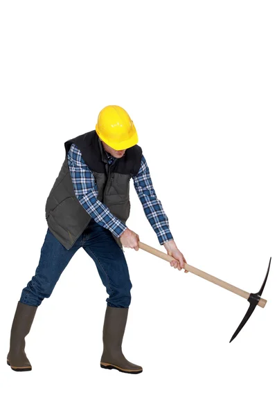 Man with a pickaxe — Stock Photo, Image