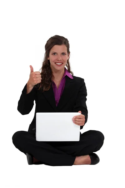 Businesswoman sat cross-legged on the floor — Stock Photo, Image