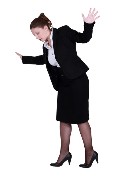 Mujer de negocios en el borde — Foto de Stock