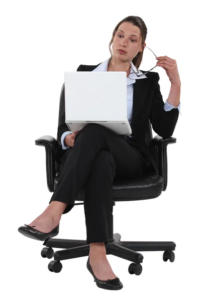 A bored businesswoman. Royalty Free Stock Photos