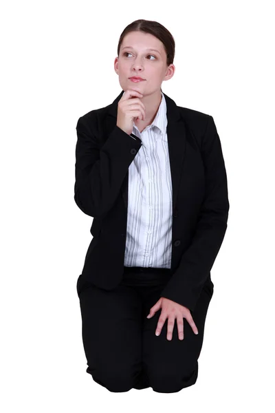 Young businesswoman looking pensive — Stock Photo, Image