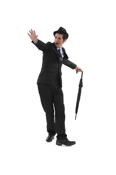 Elated homem de terno dançando com guarda-chuva — Fotografia de Stock