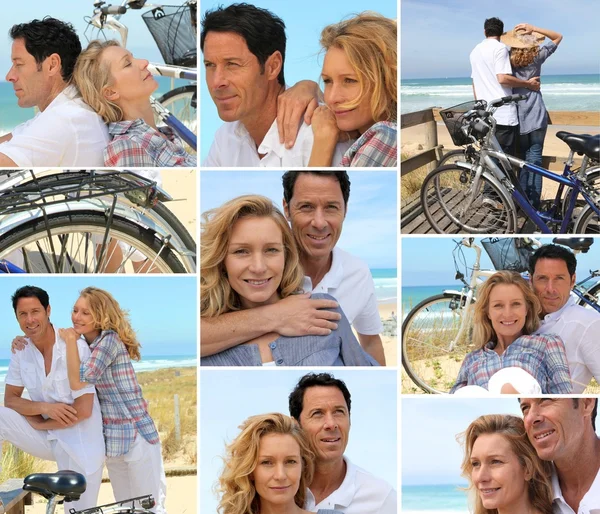 Various shots of a couple with bikes by the sea — Stok fotoğraf