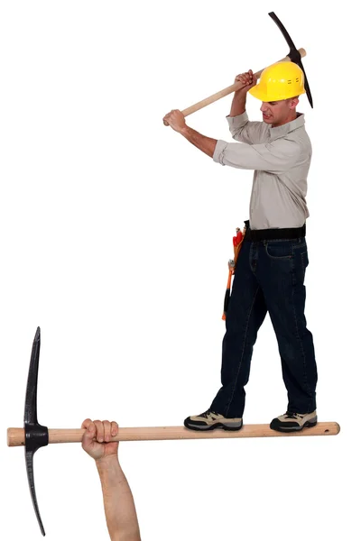 Man with a pickaxe — Stock Photo, Image