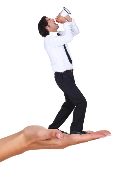 Businessman shouting into megaphone — Stock Photo, Image