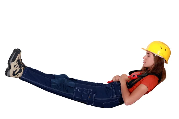 Construtor feminino descansando — Fotografia de Stock