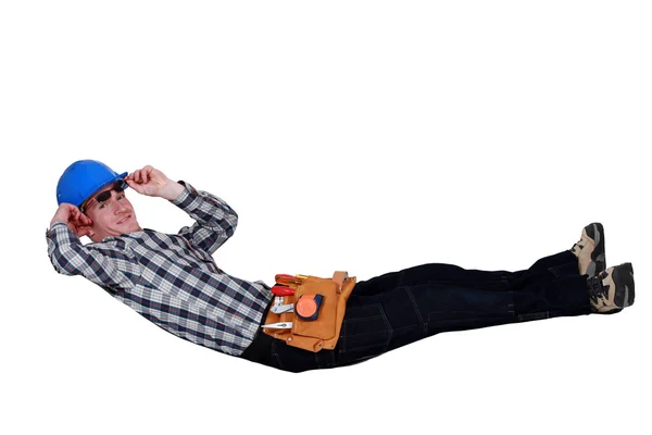 A construction worker relaxing. — Stock Photo, Image