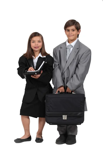 Children wearing too large business clothes — Stock Photo, Image