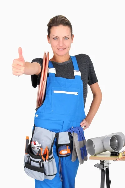 Woman plumber with thumb up — Stock Photo, Image