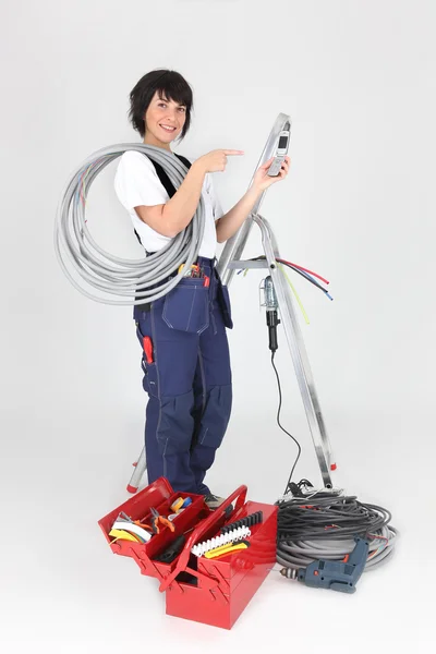 Woman electrician on white background — Stock Photo, Image