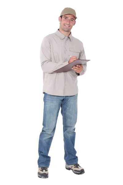 Delivery man with a clipboard Stock Photo