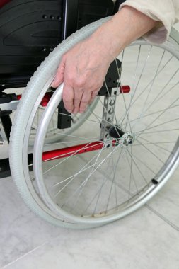 Disabled person in a wheelchair clipart