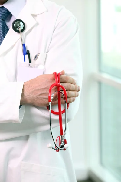 Hand of doctor with stethoscope — Stock Photo, Image