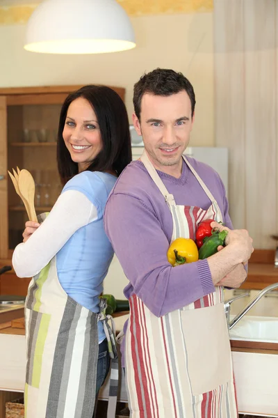 Couple cooking together — Stock Photo, Image